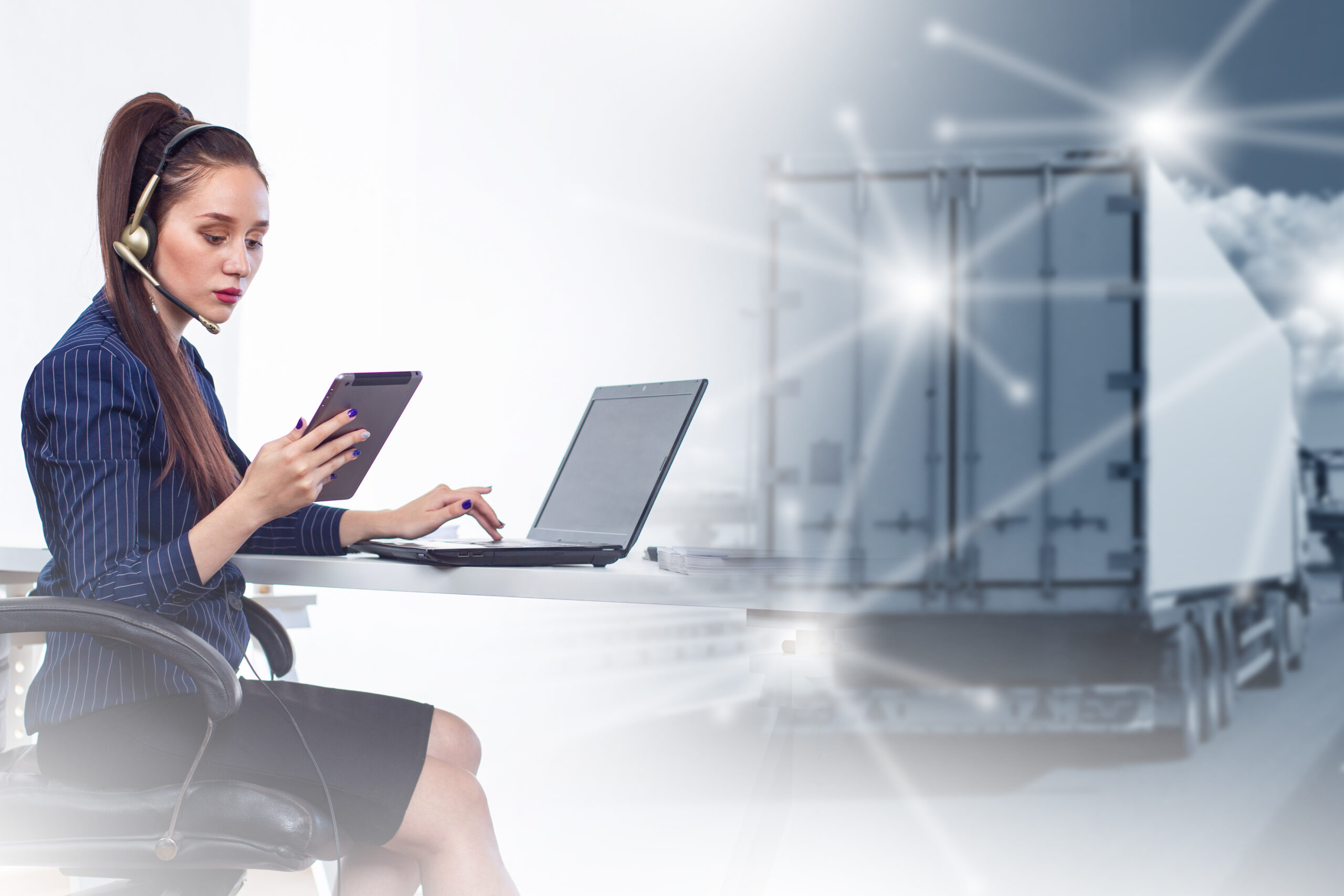 Woman business truck dispatcher. Businesswoman with gadgets working in office. Truck driving along road, rear view. Cargo logistics. Girl employee of truck business. Woman coordinating driver lorry